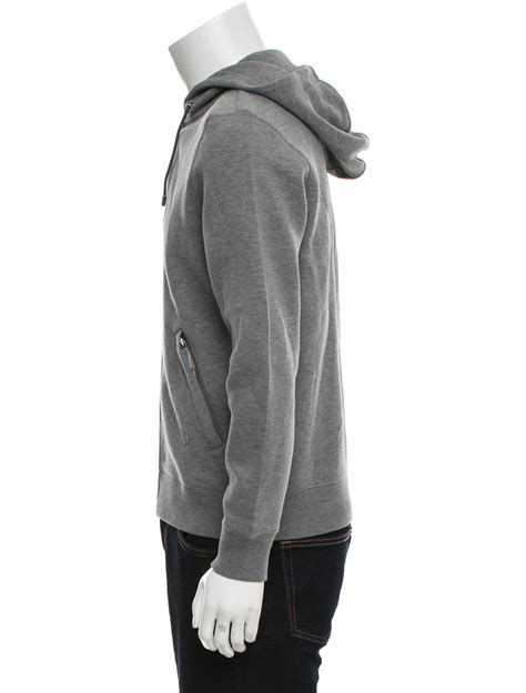 TRAVEL ZIP UP HOODIE .